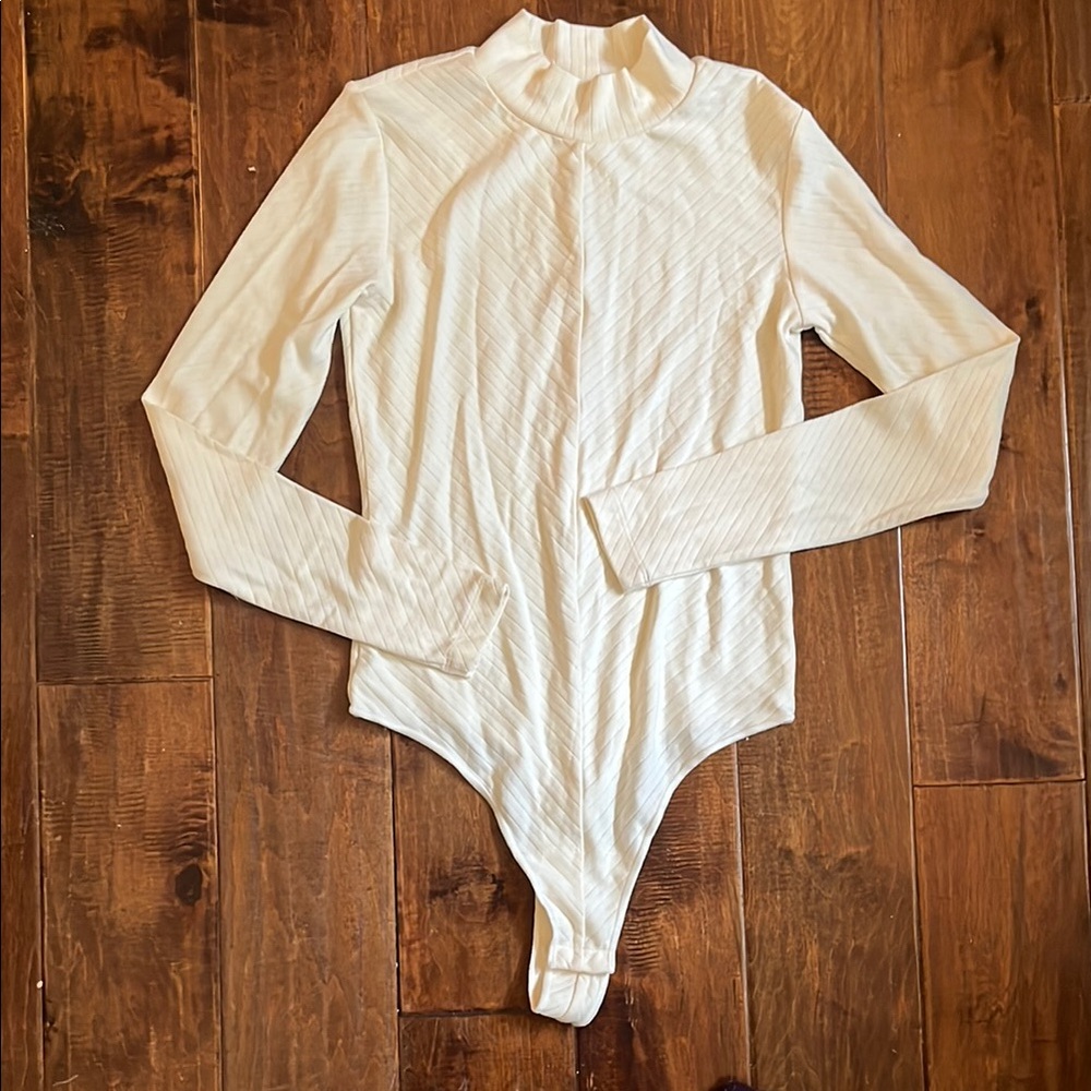 Knix Cream Long Sleeve Bodysuit with Seamless Design